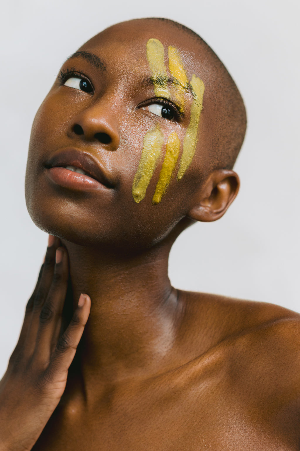 Model showcasing the future is matte face mask. Realign and rebalance your oily skin while protecting your skin’s barrier. This rejuvenating face mask is powered by purifying mineral clays and brightening botanicals that decongest pores and visibly restores radiance. Visibly less oily skin just after one use. Use weekly to support clear, healthy skin.
